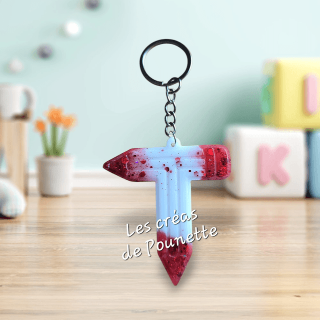 Porte-clés initiale crayons