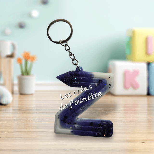 Porte-clés initiale crayons