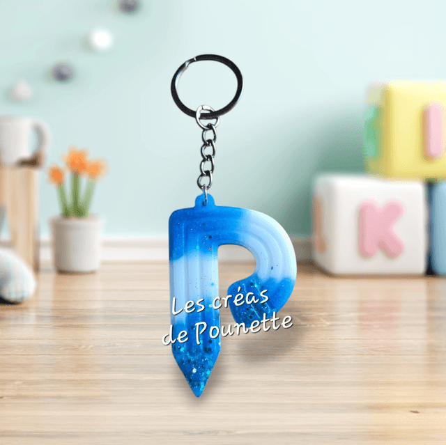 Porte-clés initiale crayons