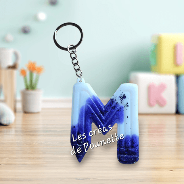 Porte-clés initiale crayons