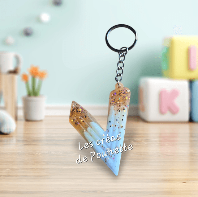 Porte-clés initiale crayons