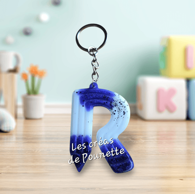 Porte-clés initiale crayons