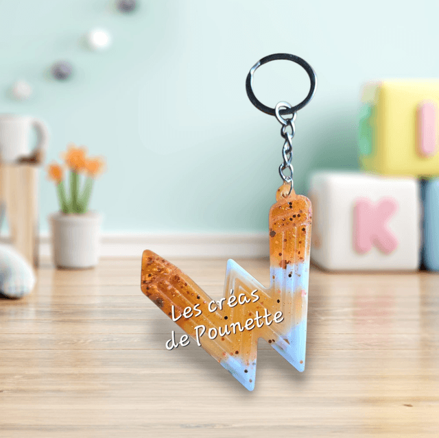 Porte-clés initiale crayons