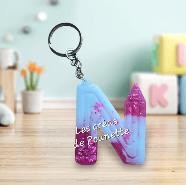 Porte-clés initiale crayons