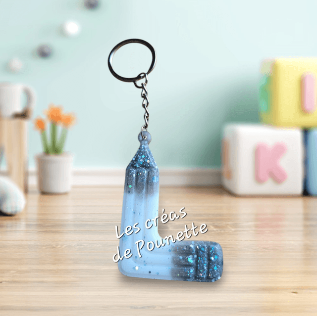 Porte-clés initiale crayons