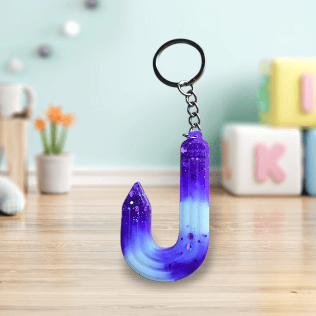 Porte-clés initiale crayons